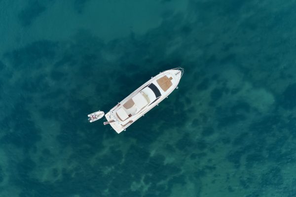 Sailboat in the sea in the evening sunlight over beautiful sea background, luxury summer adventure, active vacation in Mediterranean sea, Turkey